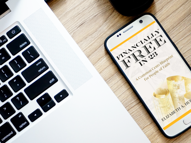 Financially Free in 23 e-book and computer keyboard